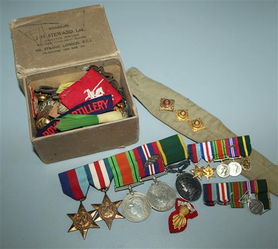 A second World War medal group including for Efficient Service, various cap badges